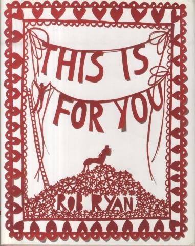 Book cover made out of kirigami with hearts on the border, a human figure sitting on a pile of flowers and title in center.