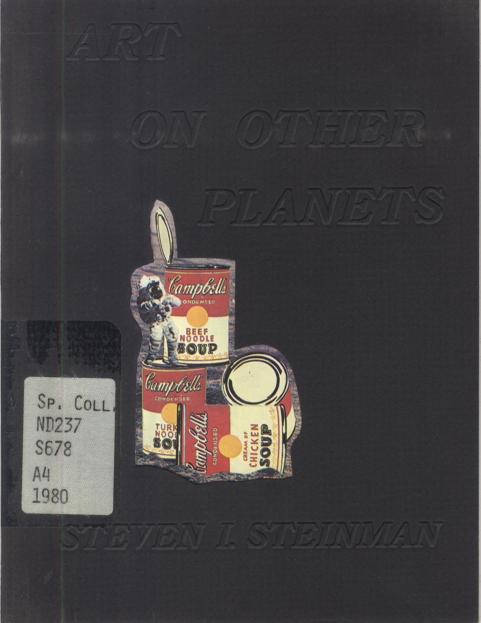 Black book cover with debossed title on top with a cutout of astronauts on moon with lifesize campbell's cans