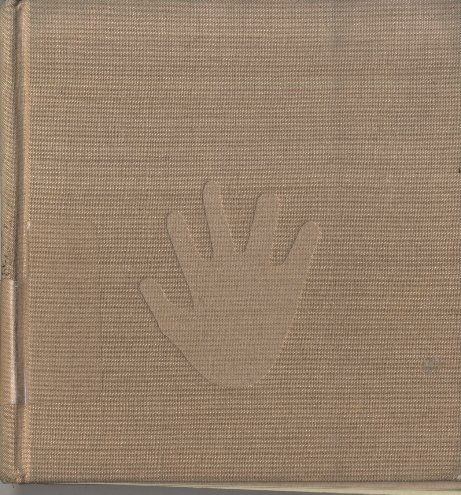 Brown canvas bookcover with an imprint of a hand. 