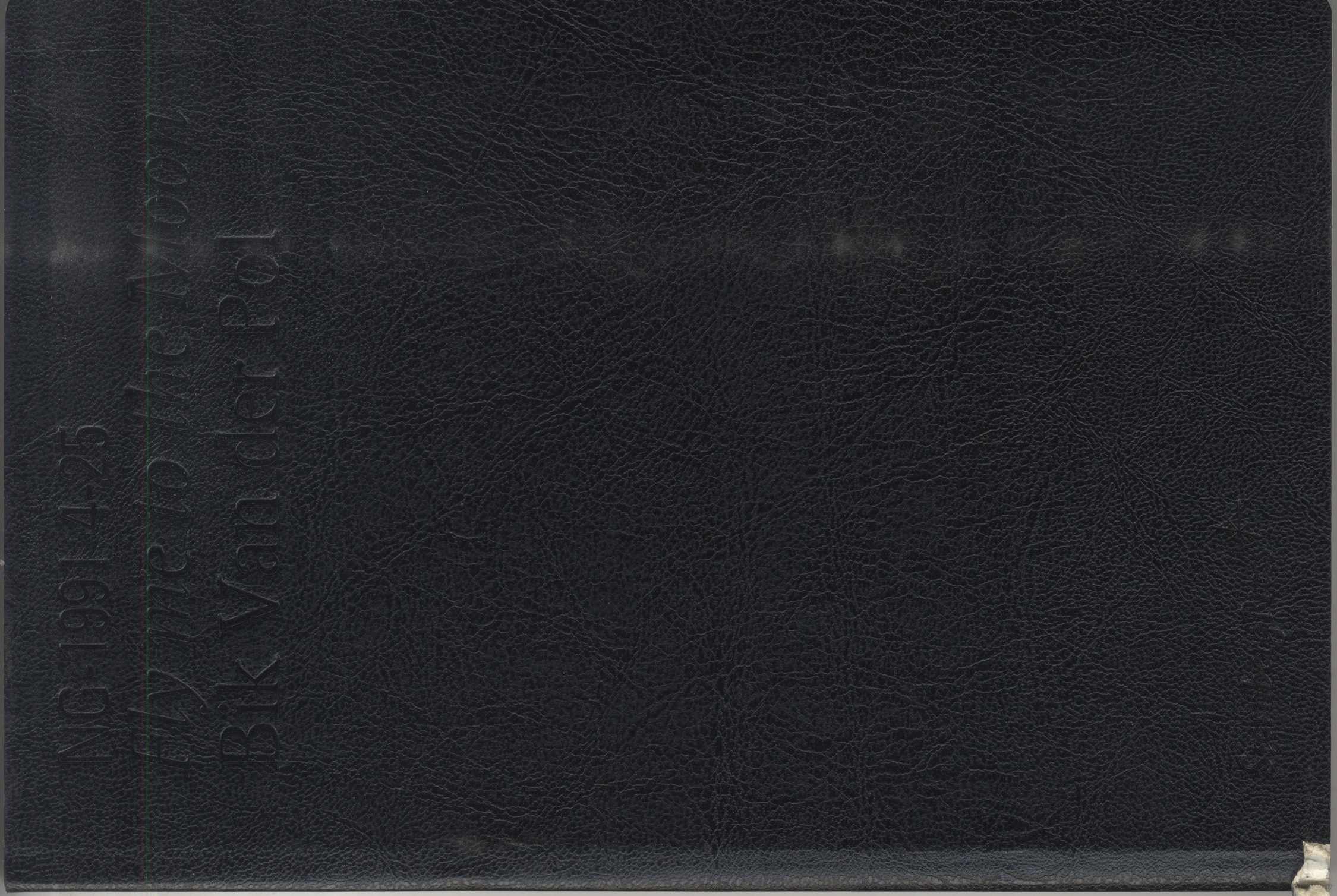 Blank black book cover with embossed title