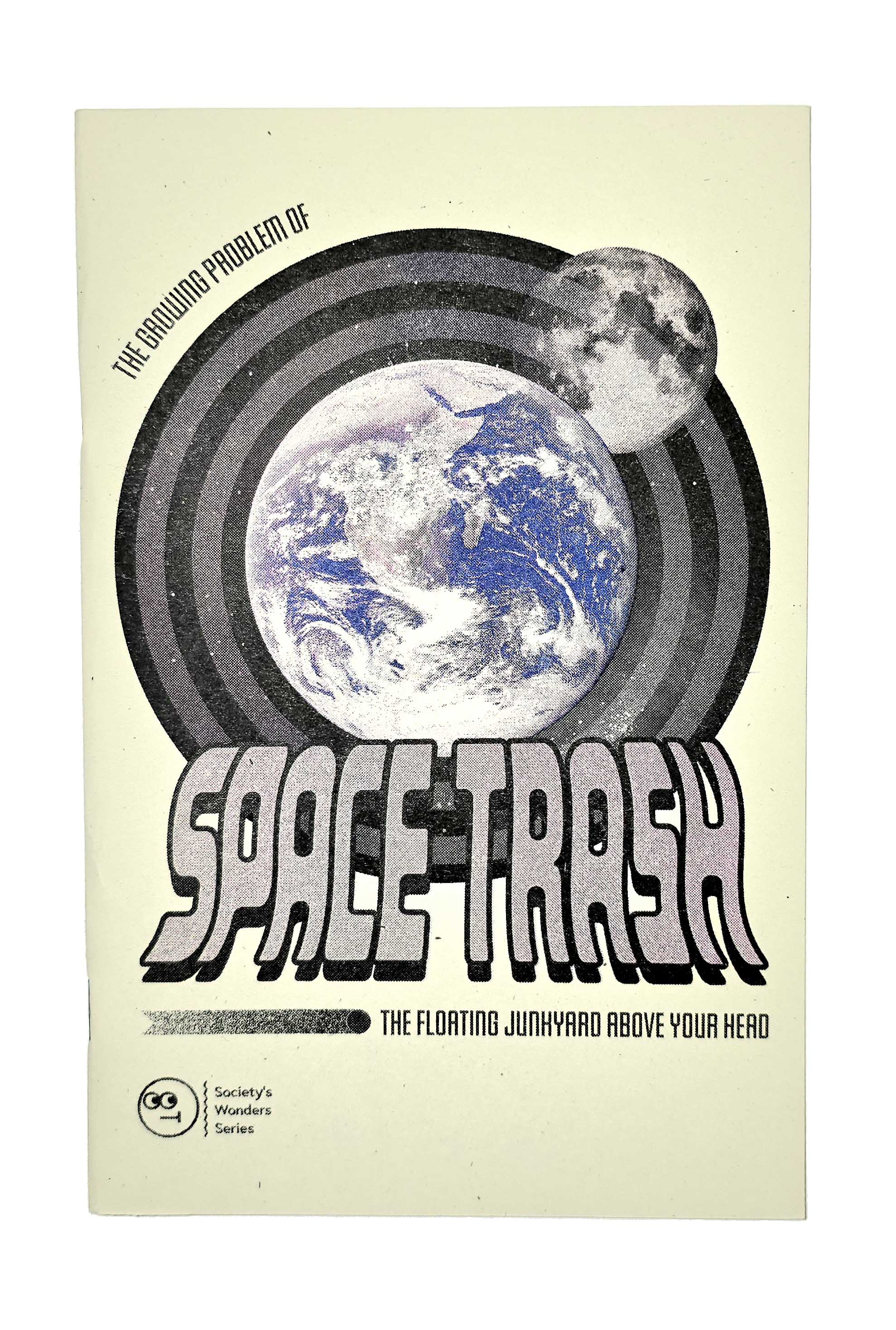 light pale green cover with a graphic of the moon and earth along with the title on the cover