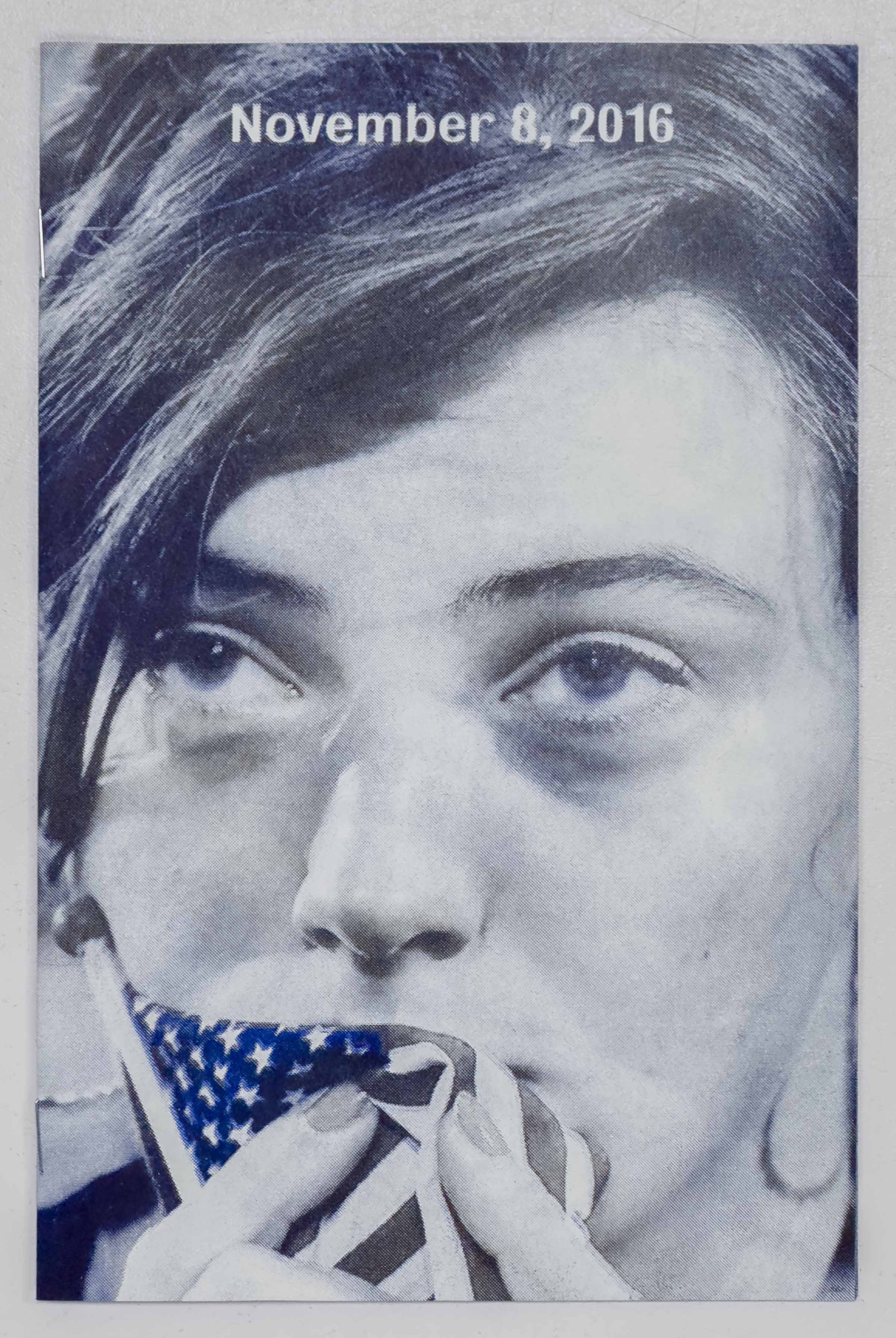 Black and white photograph of a woman holding the American flag to her lips along with the title on top