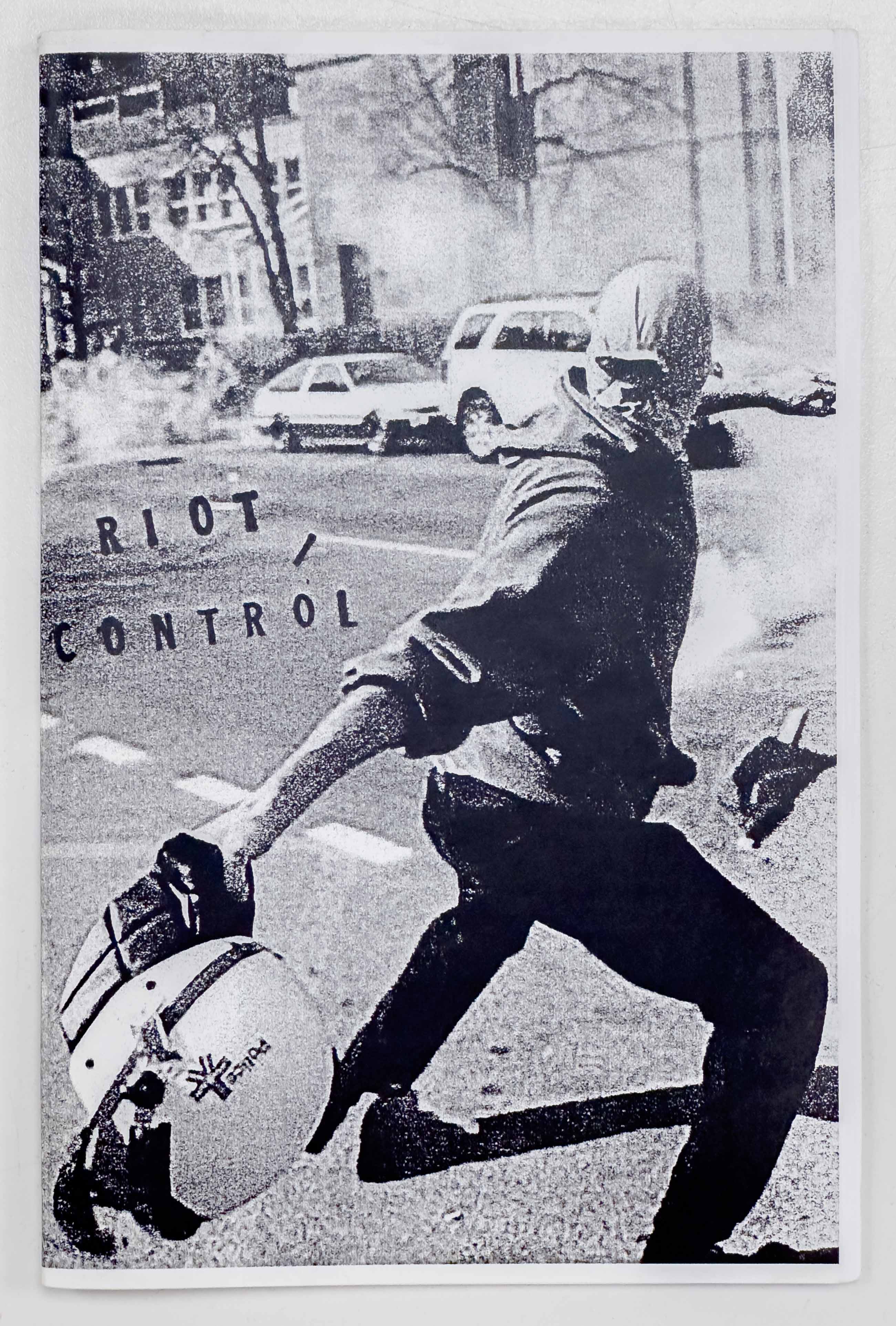 Image of a person standing in the street, throwing an object. The title, "Riot / Control,"  appears to be stamped to the left of the person.