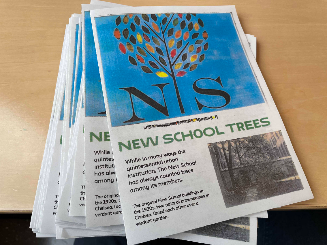A stack of newsprint zines titled New School Trees
