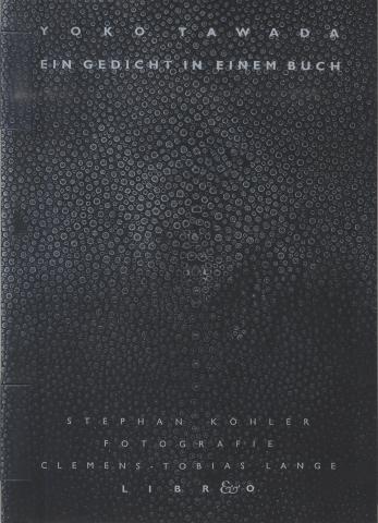 Black book cover with small circle pattern that look like dried water drops