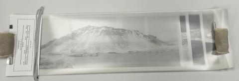 A black and white aerial panorama image of a mountain, printed on synthetic paper wrap.