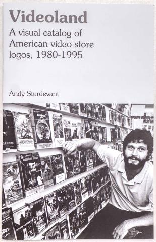 Black text of the title and authors name at the top, along with a black and white photograph of a man at a video store